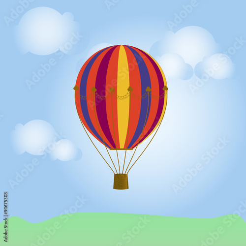 bright. colorful hot air balloon in the blue sky with clouds 