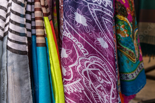 Silk scarves of various colors, exposed for sale