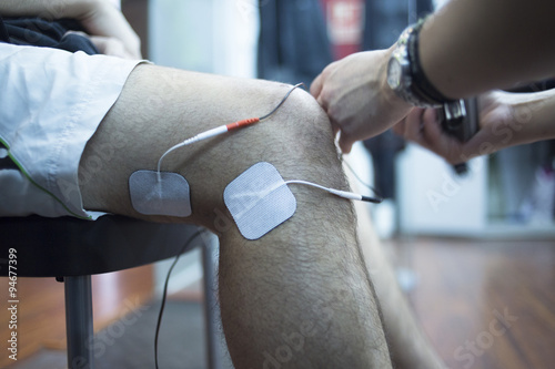 Patient knee physiotherapy rehabiliation treatment photo