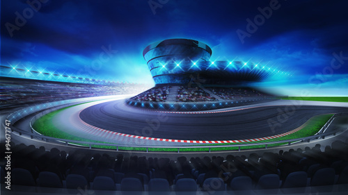 Fotografía bend on the racetrack with fans on the stands at the front