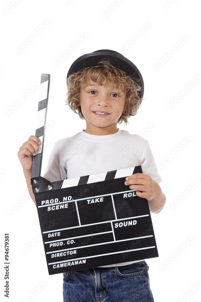 Fototapeta premium enfant garçon 6 ans tenant clap de cinéma