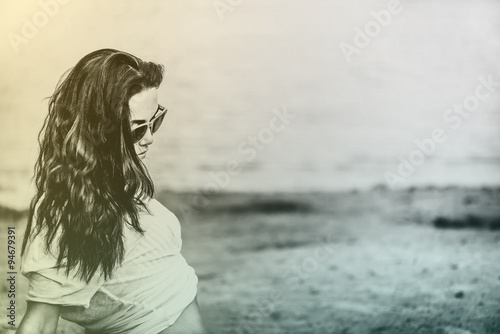 Long hair girl relaxing on the beach