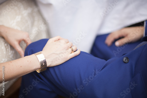 Hands of bride and bridegroom in wedding marriage