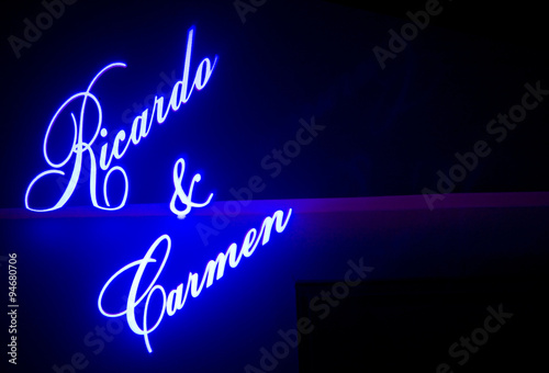 Names of wedding bride and bridegroom projected on wall