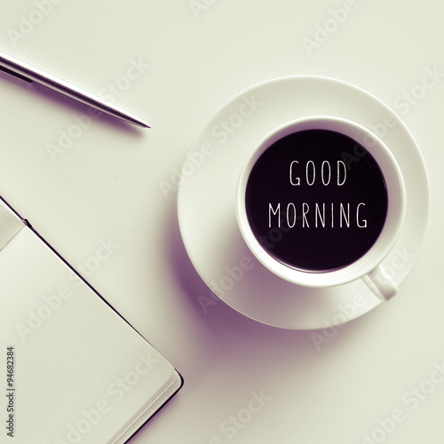 text good morning on a cup of coffee or tea