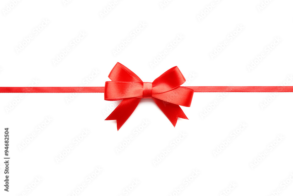 Shiny red ribbon with bow isolated on white Shiny red ribbon with bow isolated on white