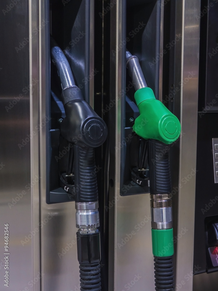 Two gas station nozzles Two gas station nozzles