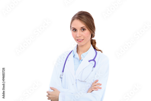 Friendly smiling young female doctor, isolated over white background