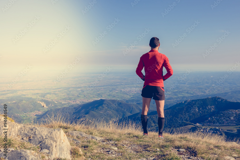 Looking the landscape from the top of the mountain after a run
