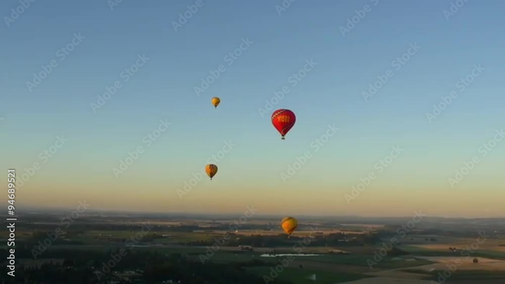 Four hot air balloons float in the sky Four hot air balloons float in the sky