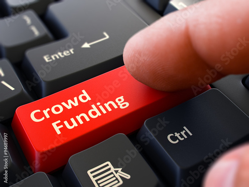 Crowd Funding - Written on Red Keyboard Key. photo