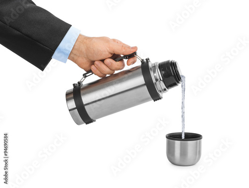 Hand and thermos flask
