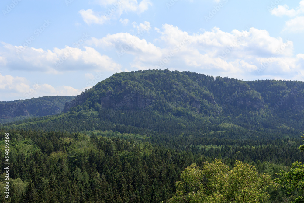 Panorama with mountain Kleiner Winterberg and forest seen from Kuhstall in Saxon Switzerland