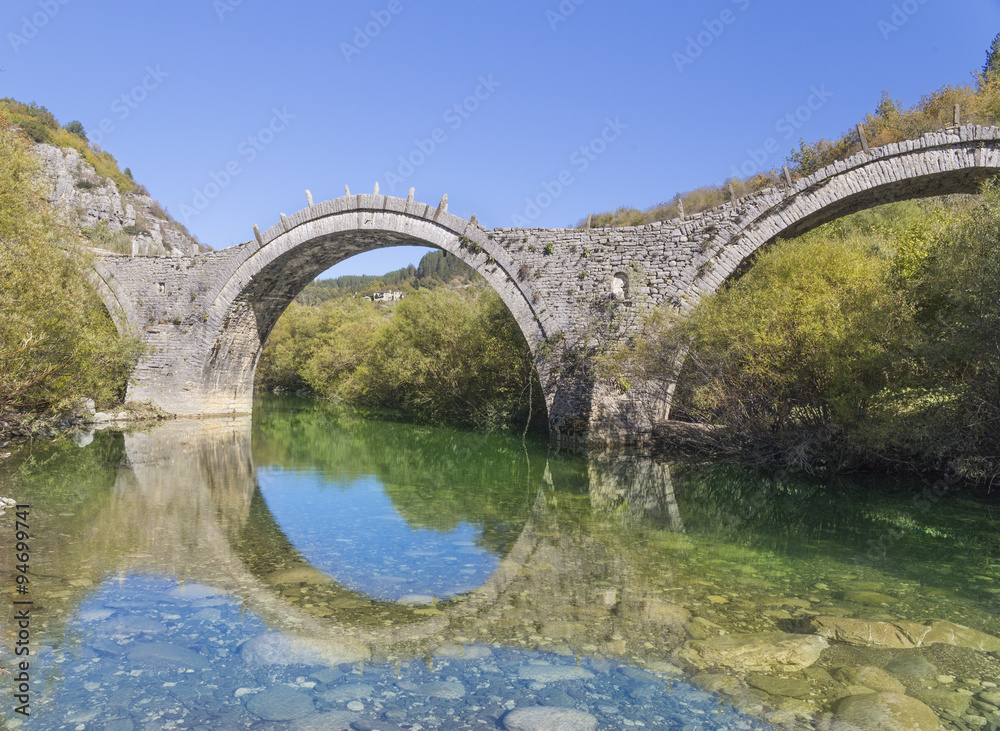 Ioannina Zagoria, Kalogeriko old arch bridge, autumn, river