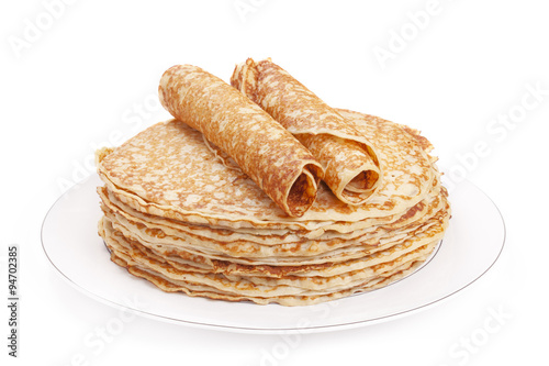 Stack of pancakes on a plate, white background