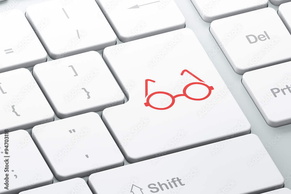 Science concept: Glasses on computer keyboard background Science concept: Glasses on computer keyboard background