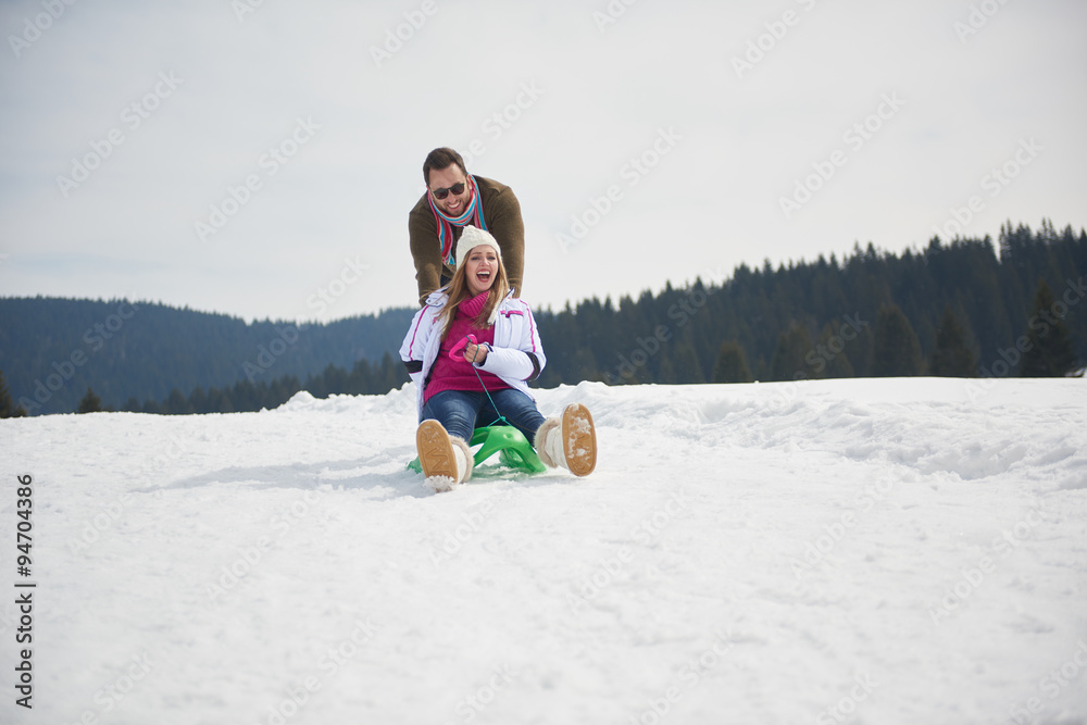 happy young couple having fun on fresh show on winter vacation happy young couple having fun on fresh show on winter vacation