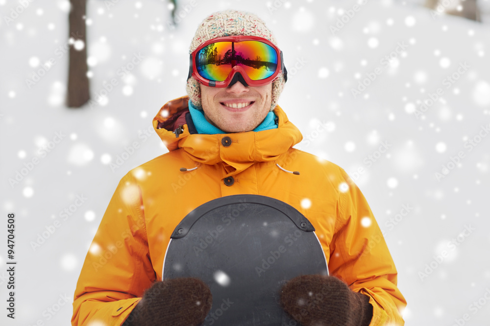 happy young man in ski goggles outdoors happy young man in ski goggles outdoors