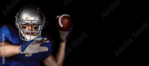 Composite image of portrait of american football throwing ball