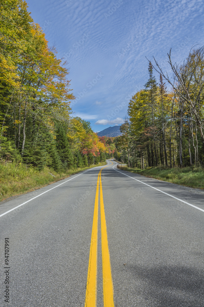 Fototapeta premium Fall colors all along an Adirondack scenic byway.