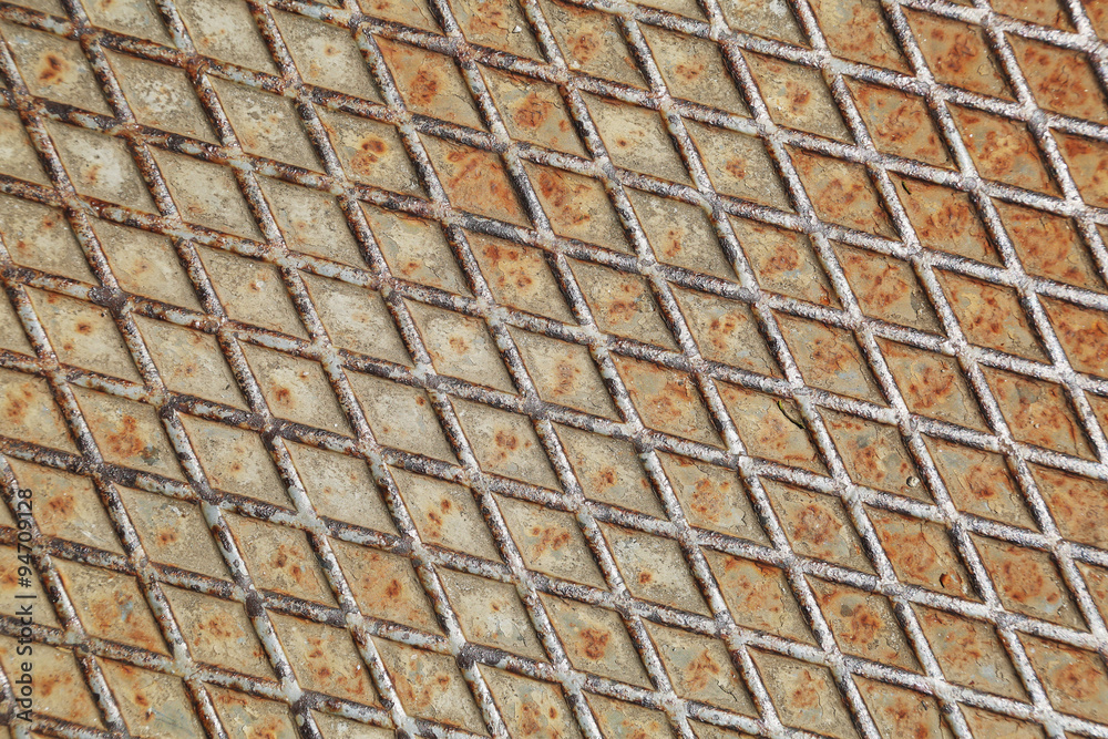 Rusty metal manhole diagonal pattern. Metal texture Rusty metal manhole diagonal pattern. Metal texture