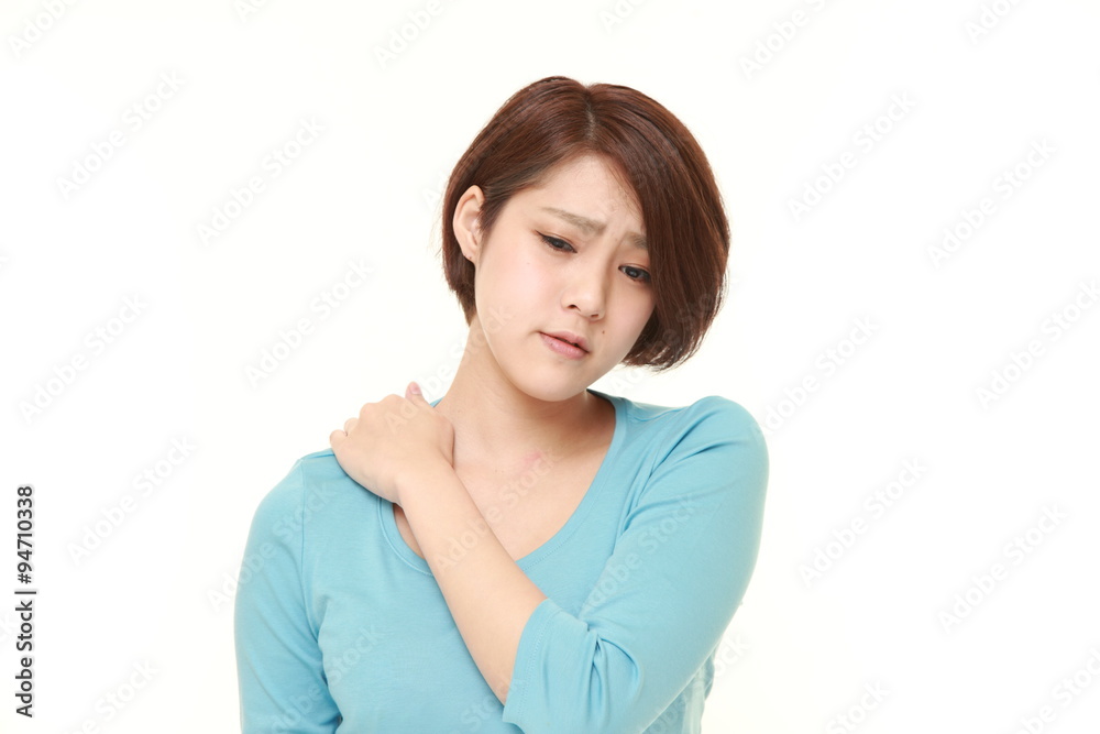 Japanese businesswoman suffers from neck ache Japanese businesswoman suffers from neck ache