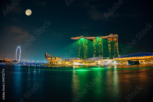 Full moon over Singapore Marina Bay Sands