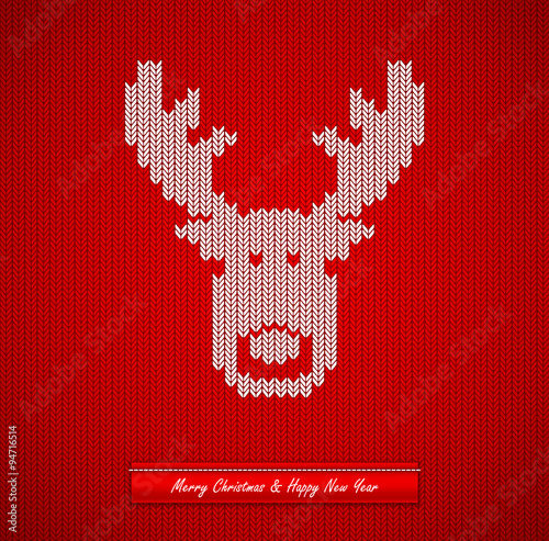 Christmas knitted background with deer