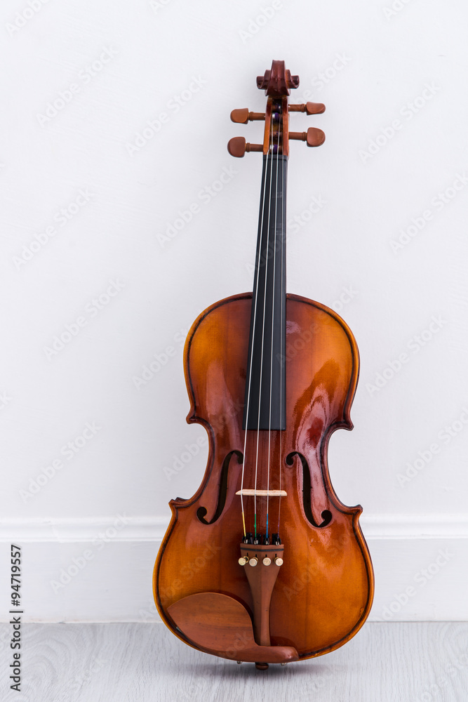 Obraz premium Classical cello on white wall background