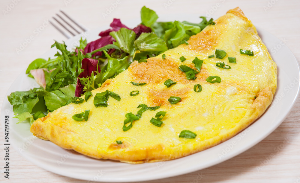 omelet with fresh mixed salad leaves omelet with fresh mixed salad leaves