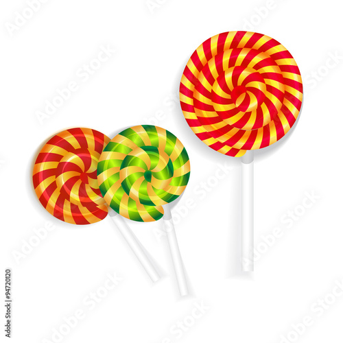 Christmas sweets. Colorful candy on a stick. Lollipops in the shape of a circle.