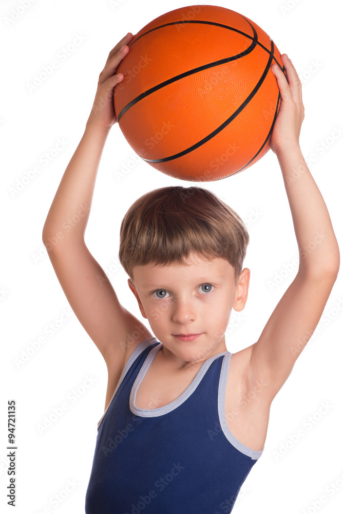Boy held a basketball ball over a head Boy held a basketball ball over a head