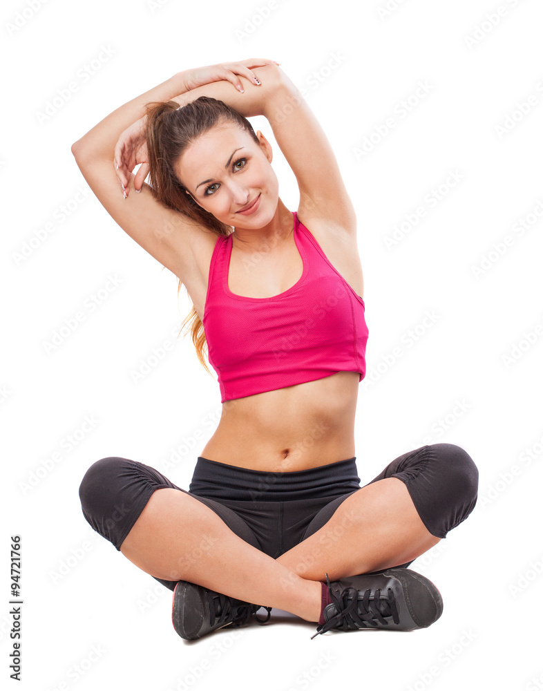 young pretty sporty girl stretching to do sport