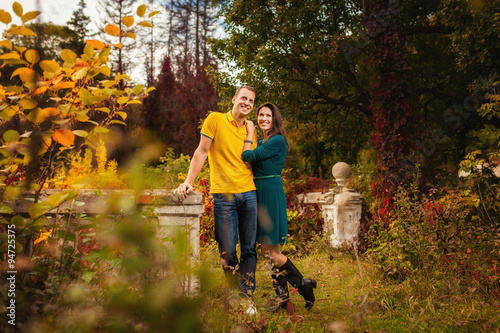 Couple, ancient place and autumn