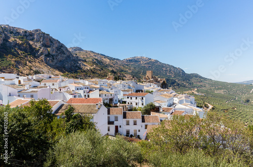 Olive trees surround hilltown of Zuheros in Andalucia © steheap