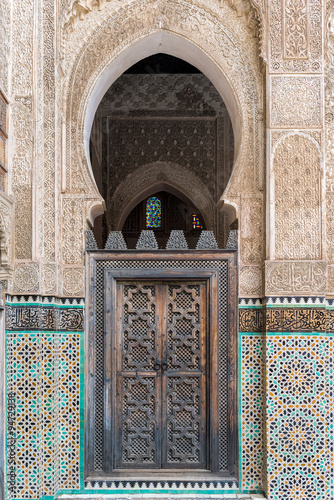 Wooden door in a Madrassa  Fez  Morocco