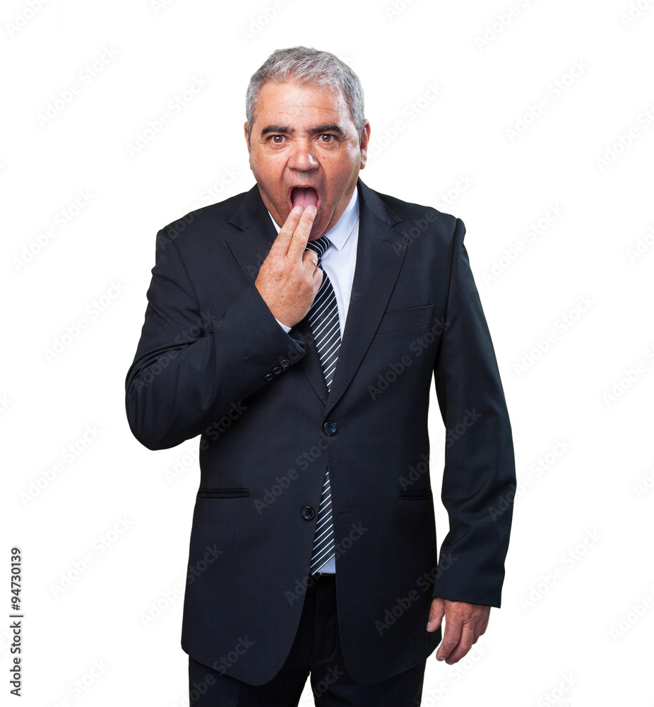 business man doing a vomit gesture