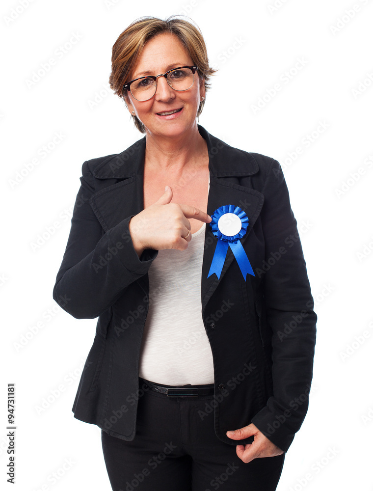 portrait of a mature business woman wearing an insignia portrait of a mature business woman wearing an insignia