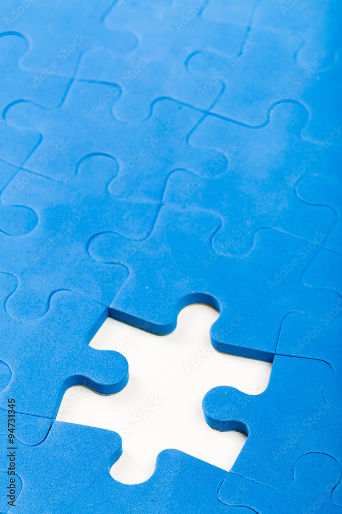 Puzzle pieces. Business concept for completing the final puzzle piece Puzzle pieces. Business concept for completing the final puzzle piece