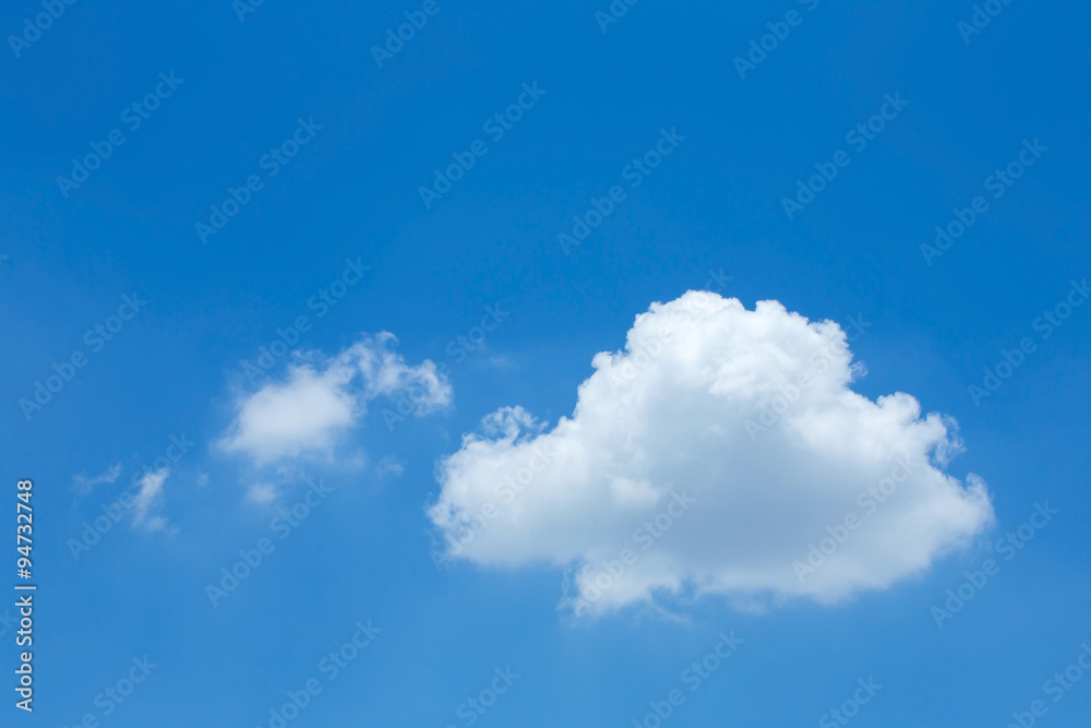 single cloud on clear blue sky background