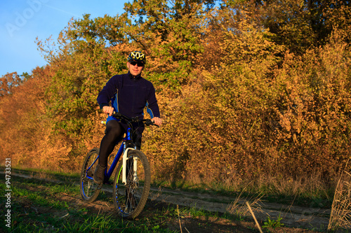Cyclist Riding the Bike