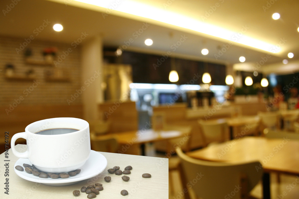 Blurred background : white cup of coffee and customer at restaur Blurred background : white cup of coffee and customer at restaur
