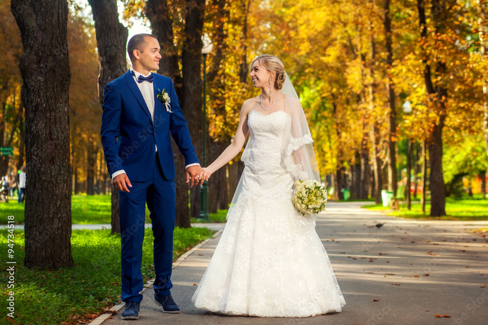 Young married couple in autumn park
