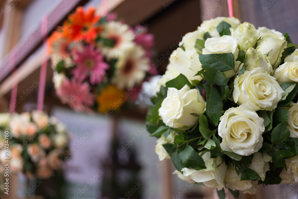 Obraz premium wedding ceremony decoration with white bouquet rose hanging