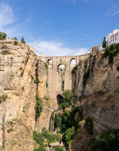 View down the steep rockface to valley in Ronda