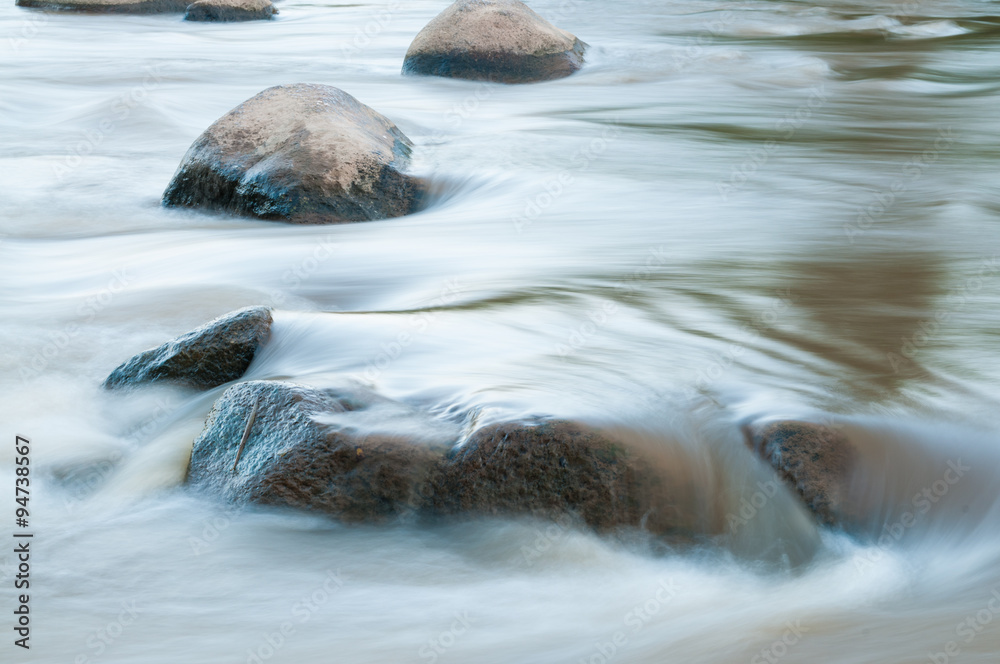 soft focused,slow speed shutter of waterfall in the forest soft focused,slow speed shutter of waterfall in the forest