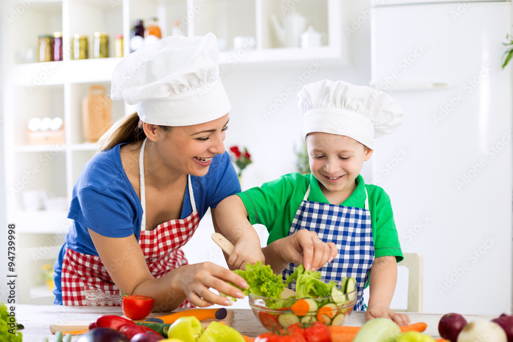 Smiling family preparing healthy food Smiling family preparing healthy food