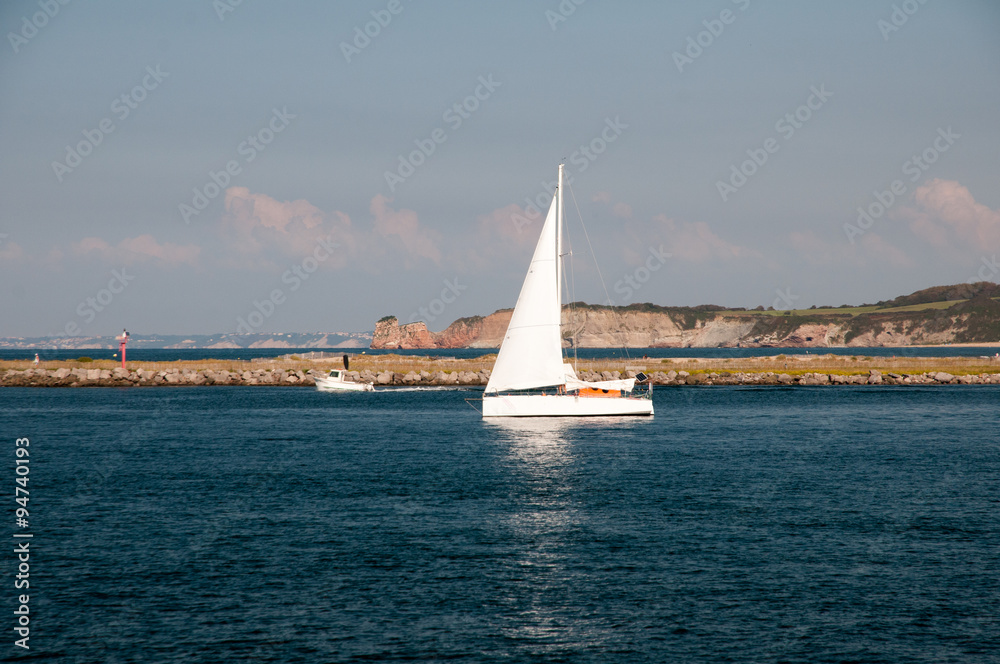 Sailing boat off Basque coast Sailing boat off Basque coast