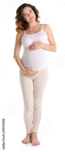 Young happy pregnant woman isolated on white background