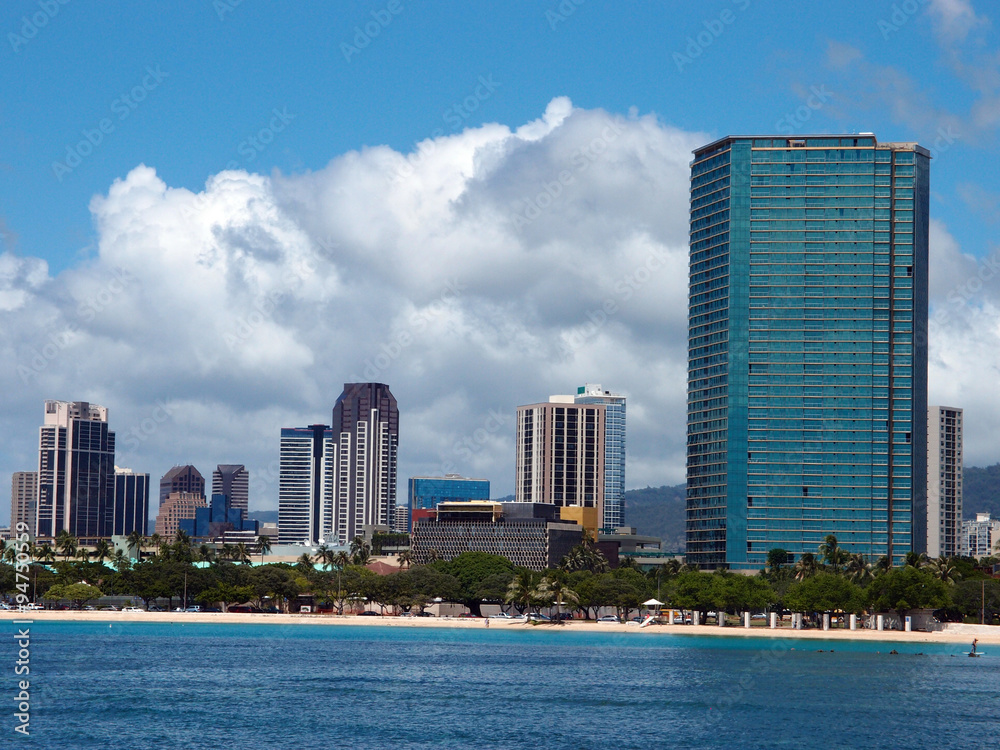 Ala Moana Beach Park with office building and condos in the back Ala Moana Beach Park with office building and condos in the back